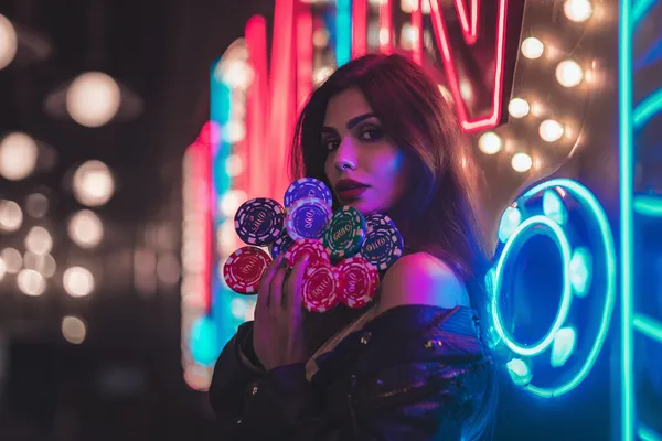 A woman in a luxurious green gown next to an ornate roulette wheel, capturing the upscale casino mood of qwe123.