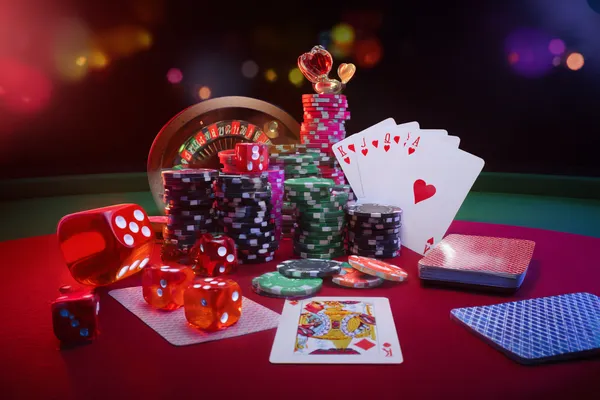 A player using their smartphone during a festive local event, representing qwe123’s fully mobile-friendly casino.